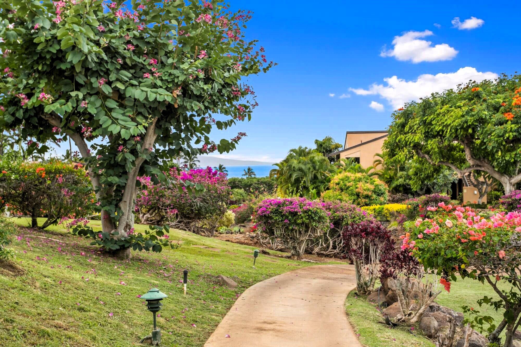 View of tropical and garden walkways of Wailea Ekahi Village Rental Condos in Wailea, Maui, Hawaii