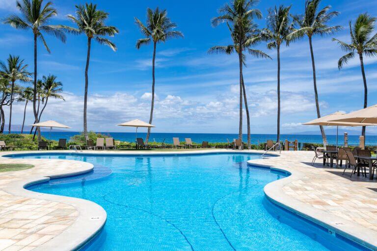 Swimming pool with a beach view at Wailea Ekahi Village Luxury Rental Condos