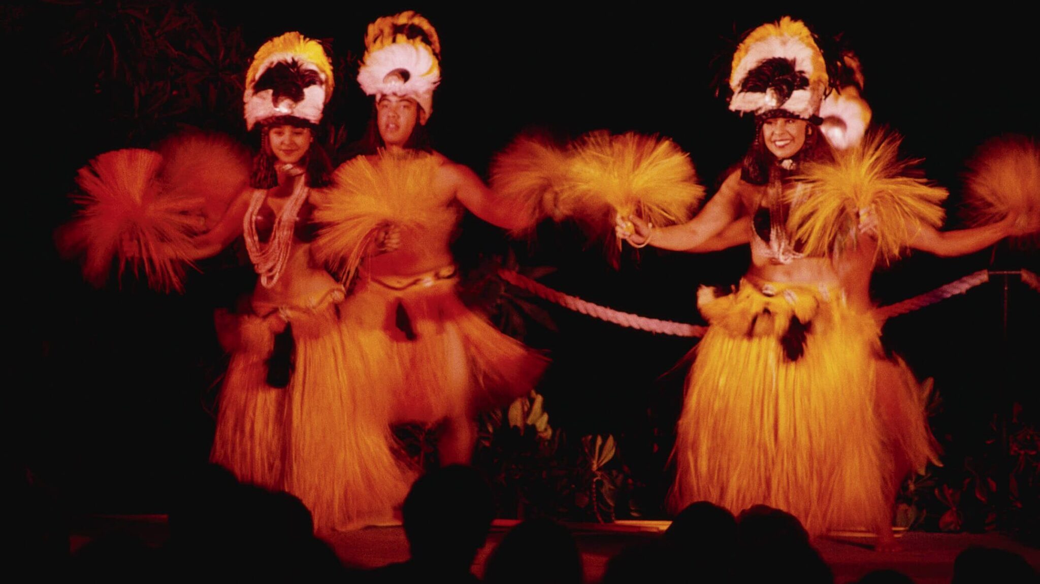 Luau show dancers entertain guests at resort at night