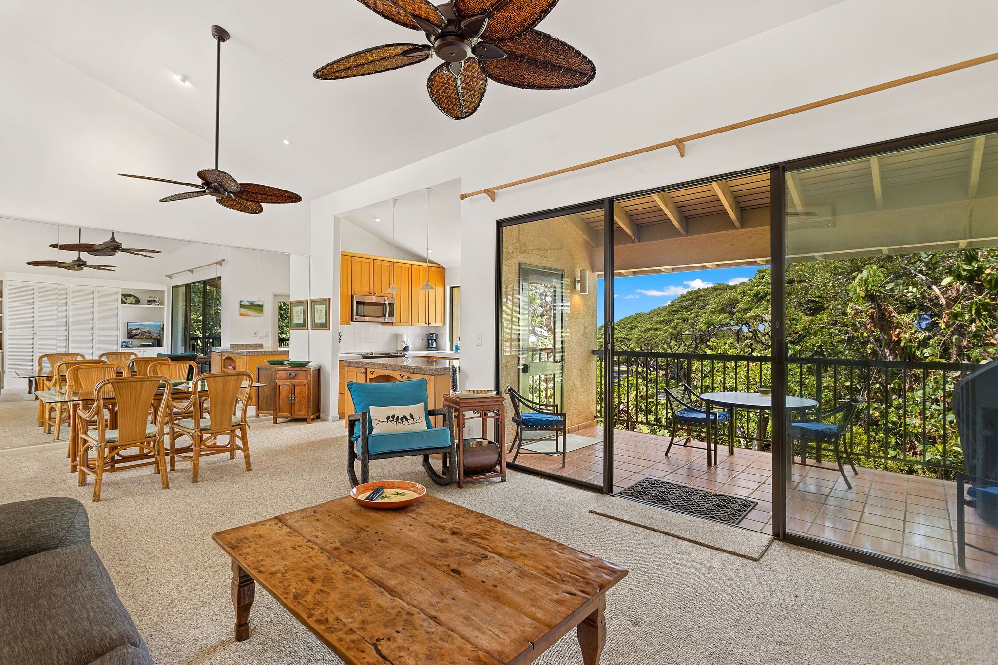 Living room, balcony, and dining view of Wailea Ekahi Village Rental Condo Ekahi 24D