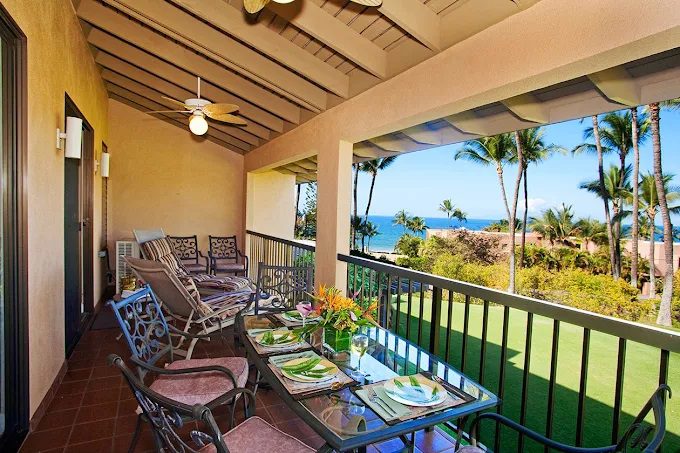 Private balcony with beautiful green and ocean views from Wailea Ekahi Village condo