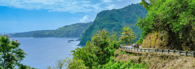 Car driving on the Road to Hana in Maui, Hawaii